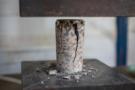 Testing the strength of a concrete sample Testing the strength of a concrete sample